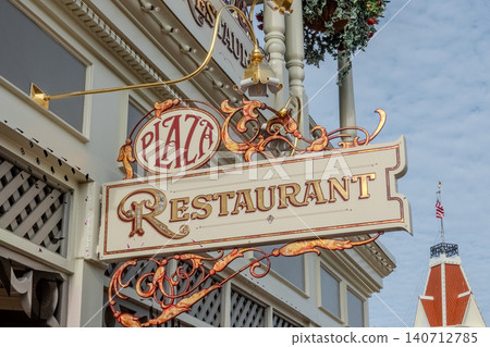 Decorative Restaurant Sign with Ornate Metalwork and Classic Architectural Details Decorative Restaurant Sign with Ornate Metalwork and Classic Architectural Details 140712785