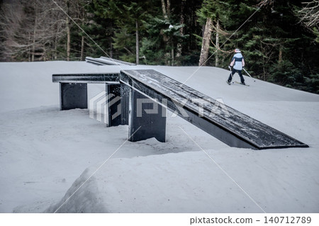 Snowshoe West Virginia Terrain Park with Snow Covered Rails Boxes and Ski Features Snowshoe West Virginia Terrain Park with Snow Covered Rails Boxes and Ski Features 140712789