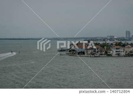 Clearwater Florida Intracoastal Waterway with Waterfront Homes and Distant Coastal Skyline  140712804