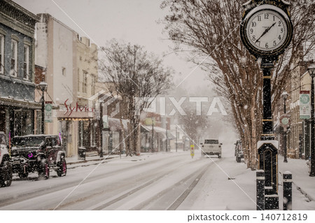 Rare Snowstorm in York South Carolina Covering Historic Downtown Main Street with Shops Benches Rare Snowstorm in York South Carolina Covering Historic Downtown Main Street with Shops Benches 140712819