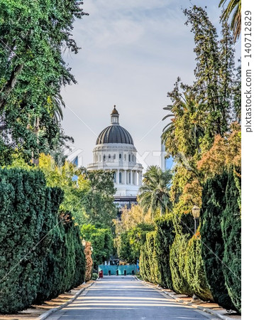 California State Capitol Framed Beautifully Through Tree Lined Sacramento Garden Path California State Capitol Framed Beautifully Through Tree Lined Sacramento Garden Path 140712829