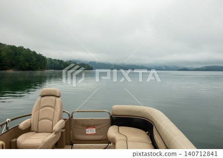 Boating on Lake Jocassee South Carolina with Pontoon Boat Seating and Calm Water Boating on Lake Jocassee South Carolina with Pontoon Boat Seating and Calm Water 140712841
