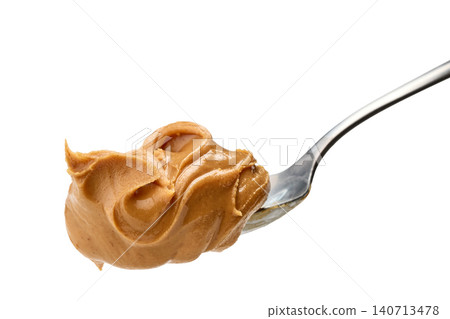 Spoon of Peanut Butter Isolated on White Background Spoon of Peanut Butter Isolated on White Background 140713478