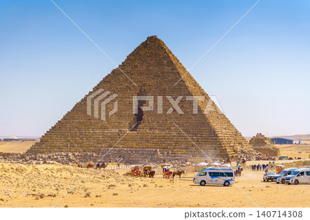 Giza, Egypt - Mar 11 2023, Panoramic view of pyramid of Mikerin with hole on it, at daytime, Giza, Egypt 140714308