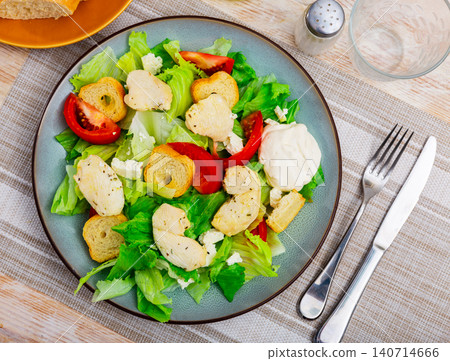 Popular dish of american cuisine is Caesar salad 140714666