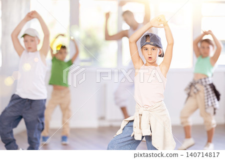 Tween girl mastering krump dance in children dance studio Tween girl mastering krump dance in children dance studio 140714817