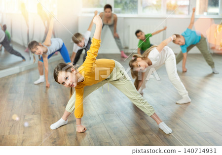 Group of children warming up before dance class Group of children warming up before dance class 140714931