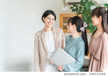 Businesswoman, designer, working woman with laptop in casual clothes (dress code not required) Businesswoman, designer, working woman with laptop in casual clothes (dress code not required) 140715569
