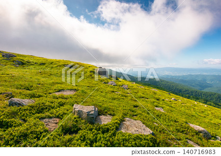 nature scenery with mountain under summer sky. alpine landscape of carpathian mountain with grassy slopes. low fluffy clouds on high altitude. summer vacations nature scenery with mountain under summer sky. alpine landscape of carpathian mountain with grassy slopes. low fluffy clouds on high altitude. summer vacations 140716983
