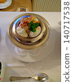 An elegant hotel dessert garnished with mint. 140717538