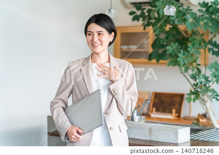 Stylish woman with laptop, office casual, designer, businesswoman Stylish woman with laptop, office casual, designer, businesswoman 140718246