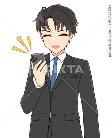 A handsome young man in a suit smiles while looking at his smartphone. A handsome young man in a suit smiles while looking at his smartphone. 140718655