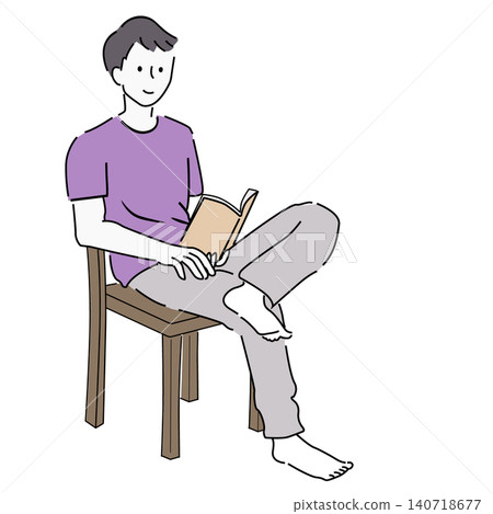 一個男人坐在椅子上,正在讀書。 一個男人坐在椅子上,正在讀書。 140718677