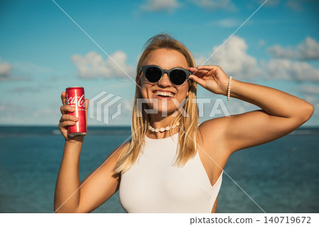 Bali, Indonesia, March 18, 2026: Coca-Cola drink at the beach 140719672