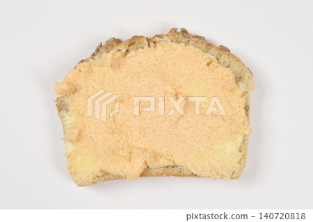 Slice of whole grain bread with smoked salmon roe spread Slice of whole grain bread with smoked salmon roe spread 140720818