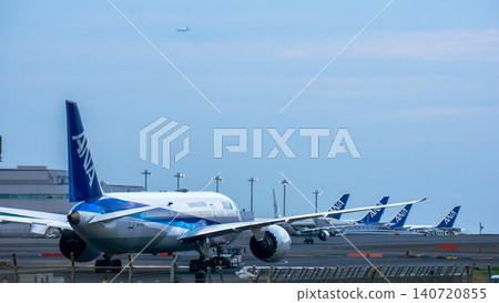 ANA planes lined up on the runway at Haneda Airport ANA planes lined up on the runway at Haneda Airport 140720855