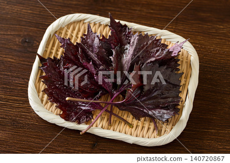 Red shiso on a colander Red shiso on a colander 140720867