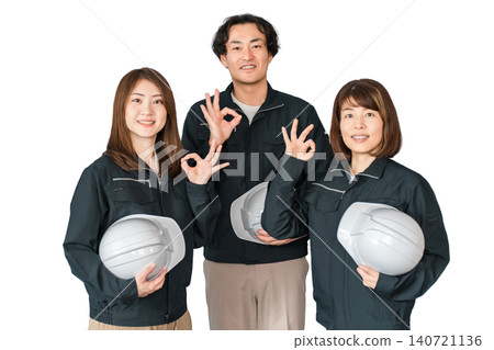 Employees and staff (businessmen and businesswomen) wearing work clothes working at small and medium-sized enterprises such as factories and construction companies. Employees and staff (businessmen and businesswomen) wearing work clothes working at small and medium-sized enterprises such as factories and construction companies. 140721136