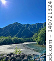 The Azusa River and the Hotaka mountain range in Kamikochi: A summer mountain landscape. 140721324