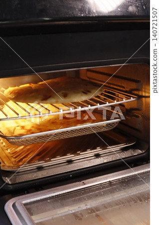 Baking Food in Oven Interior Baking Food in Oven Interior 140721507