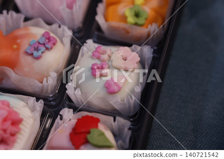 Colorful Decorated Pastries in Tray Colorful Decorated Pastries in Tray 140721542