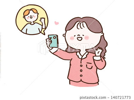 A woman in her pajamas enjoying a video call on her smartphone (long-distance relationship, spending time at home). A woman in her pajamas enjoying a video call on her smartphone (long-distance relationship, spending time at home). 140721773