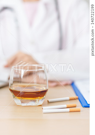 doctor hand making stop sign to refuse whiskey and breaking cigarette, quit smoking and drinking for healthy liver and lung, World No Tobacco and  No Alcohol Day and stop alcohol addiction concept 140722199