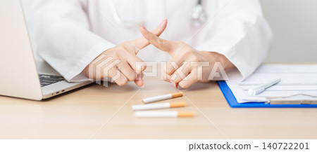 doctor hand making stop sign to refuse and breaking cigarette, quitting smoking for healthy lungs, prevent Lung Cancer and Emphysema, World No Tobacco Day concept doctor hand making stop sign to refuse and breaking cigarette, quitting smoking for healthy lungs, prevent Lung Cancer and Emphysema, World No Tobacco Day concept 140722201