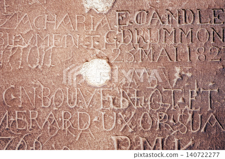 Historic engravings on stone wall of Strasbourg Cathedral, France Historic engravings on stone wall of Strasbourg Cathedral, France 140722277