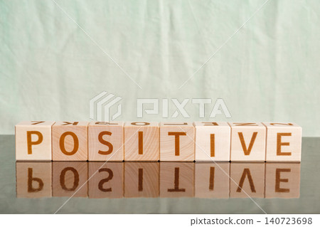 positive, motivational word made of letters on wooden cubes positive, motivational word made of letters on wooden cubes 140723698