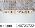 unstoppable, motivational word made of letters on wooden cubes 140723722