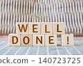 well done !, motivational phrase made of letters on wooden cubes 140723725