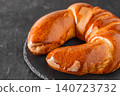 sweet roll bagel on slate panel, selective focus 140723732
