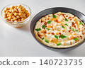 hummus in bowl with olive oil and chickpeas, selective focus 140723735
