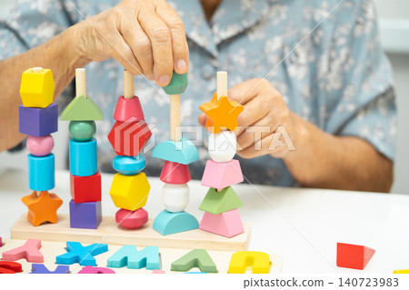 Asian elderly woman patient learn practical motor skills. 140723983