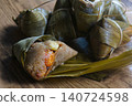 Delicious Sticky Rice Dumplings or Chinese Tamales Group 140724598