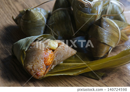 Delicious Sticky Rice Dumplings or Chinese Tamales Group Delicious Sticky Rice Dumplings or Chinese Tamales Group 140724598