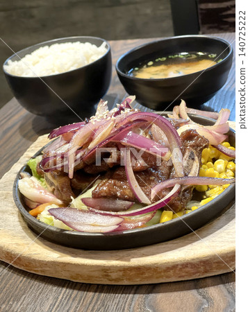 Sizzling Beef Ribs with Corn and Red Onion Served with Rice and Miso Soup Sizzling Beef Ribs with Corn and Red Onion Served with Rice and Miso Soup 140725222