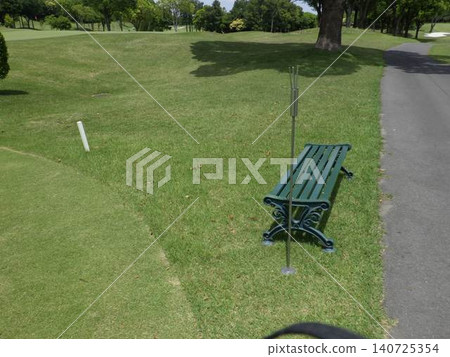 Green of golf course with white banner Green of golf course with white banner 140725354