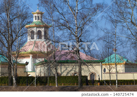 Historic Chinese-style pavilion with colorful tiered roofs 140725474