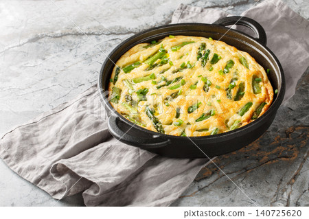Keto diet asparagus frittata mea closeup in the skillet. Horizontal Keto diet asparagus frittata mea closeup in the skillet. Horizontal 140725620