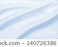 Smooth elegant blue silk or satin luxury cloth texture as abstract background. Luxurious background design 140726386