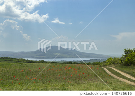 Palava Hills landscape with poppy field and Nove Mlyny reservoir Palava Hills landscape with poppy field and Nove Mlyny reservoir 140726616