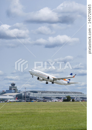 Passenger airplane taking off from Prague Airport Passenger airplane taking off from Prague Airport 140726665