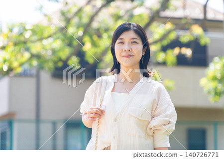 A woman going out A woman going out 140726771