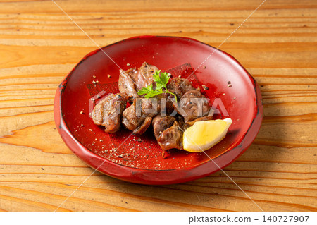 Enjoy the unique texture and charcoal aroma of grilled chicken gizzards. Enjoy the unique texture and charcoal aroma of grilled chicken gizzards. 140727907