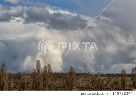Dramatic Storm Clouds Over Rural Landscape Dramatic Storm Clouds Over Rural Landscape 140728344