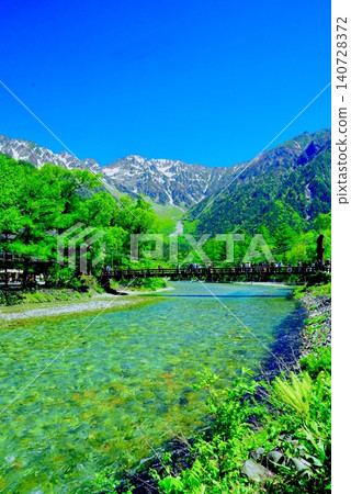 The beautiful mountain scenery of Kamikochi with its clear streams. The beautiful mountain scenery of Kamikochi with its clear streams. 140728372