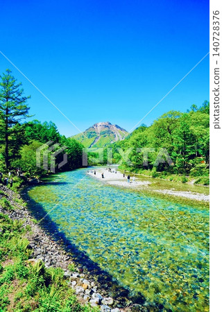The beautiful mountain scenery of Kamikochi with its clear streams. The beautiful mountain scenery of Kamikochi with its clear streams. 140728376