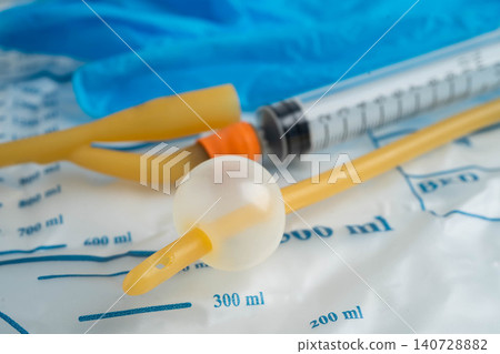 Foley catheter and urine drainage bag collect urine for disability or patient in hospital. Foley catheter and urine drainage bag collect urine for disability or patient in hospital. 140728882